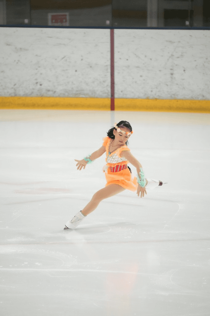 Hanaka Yamamoto performing on the ice in competition costume