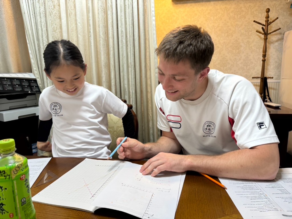 Teacher leading a small-group lesson in the TGA classroom