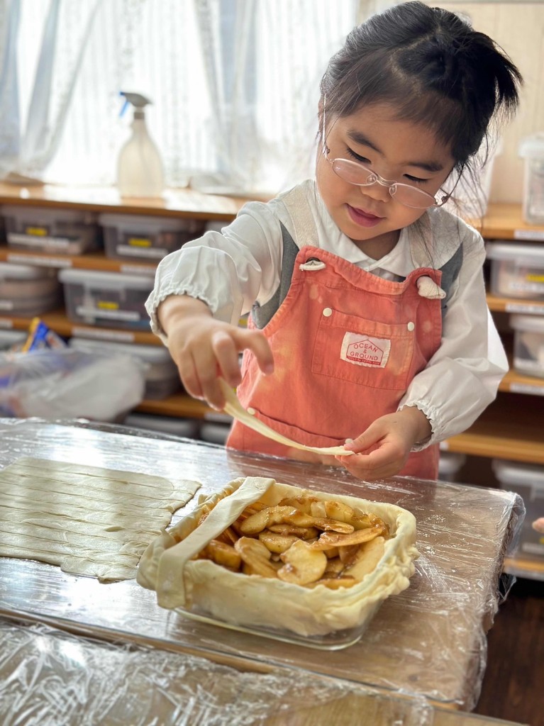 Student practising practical life skills with Montessori tools