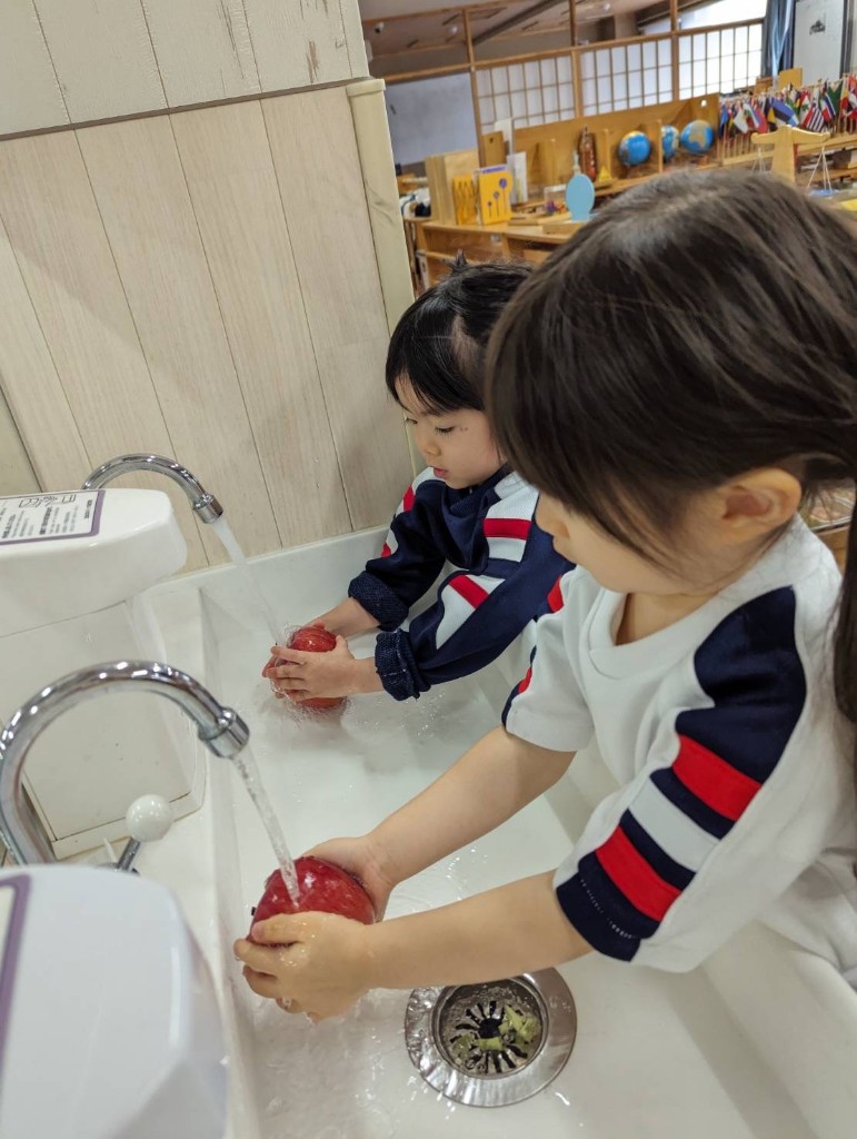 Student practising practical life skills with Montessori tools