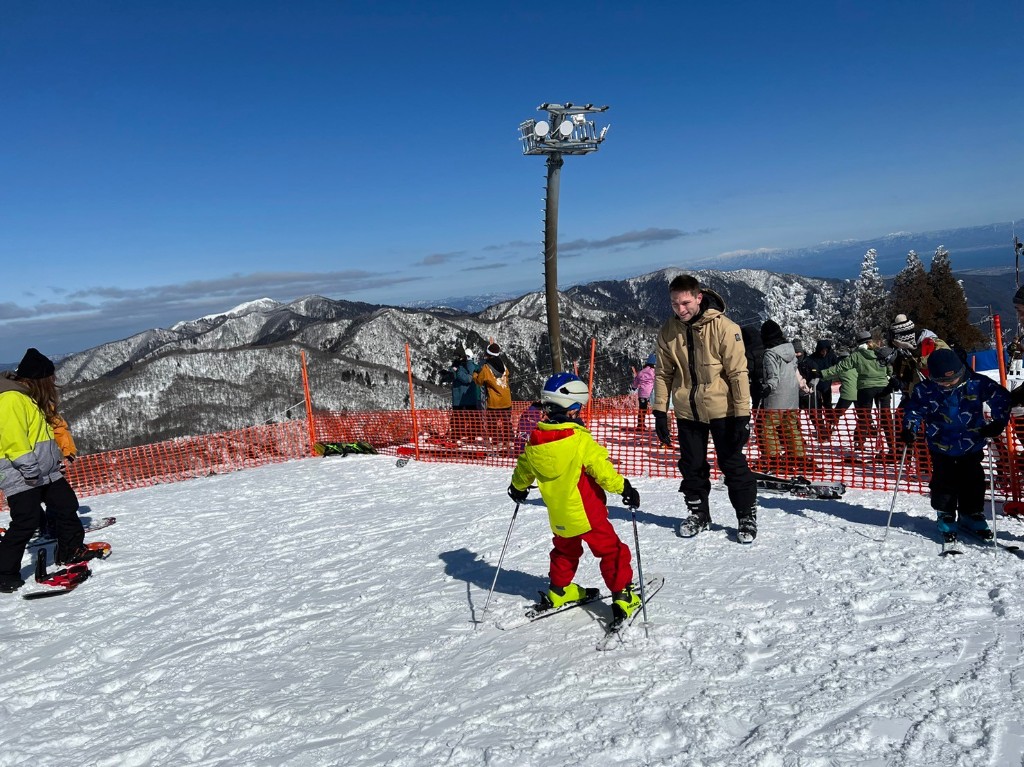Student skiing on a snowy mountain during the SSW winter program