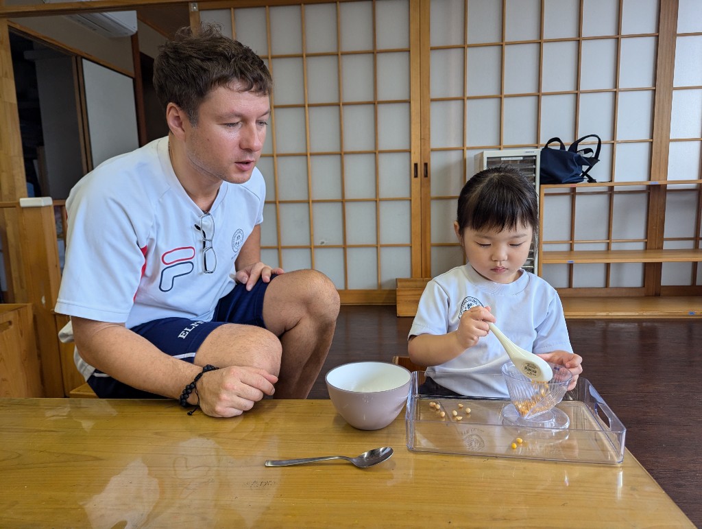 Student practising practical life skills with Montessori tools